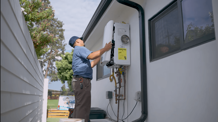 Plumber repairing a water heater in Jacksonville, Florida